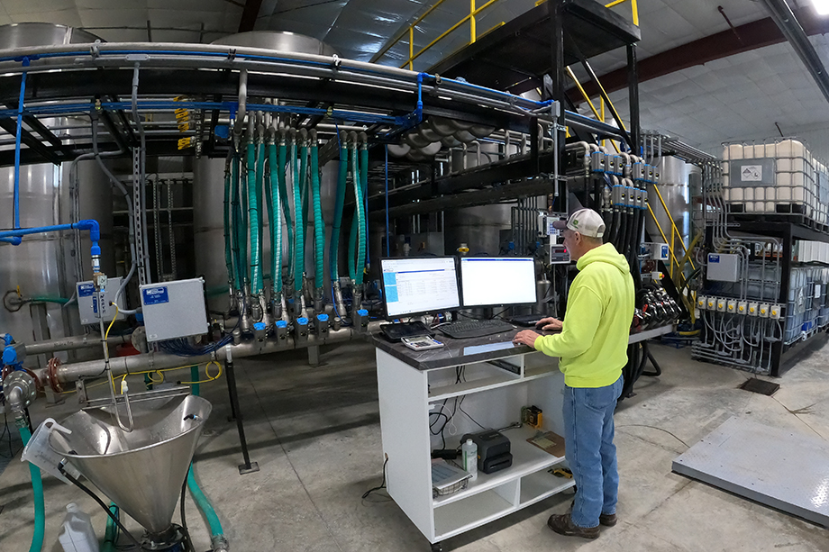 Liquid control software TMX PSX tank valve storage scale tote interior people